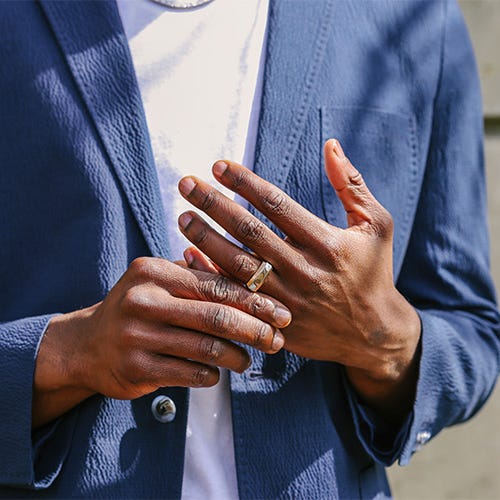 Man wearing Charles and Colvard ring