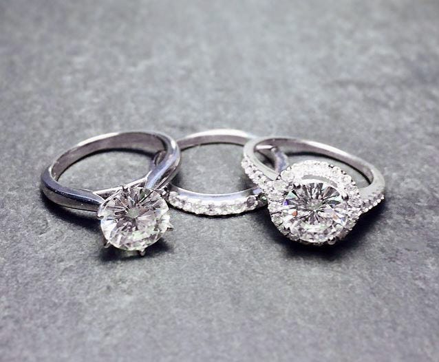Bezel set moissanite engagement ring