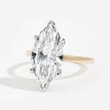 Yellow gold marquise solitaire ring.